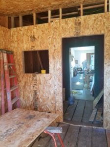 Putting up plywood