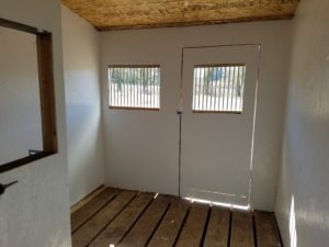 Painting the walls and putting vertical bars in the windows